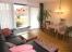 Wohnzimmer mit Zugang zum Garten
