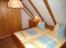 1. Schlafzimmer mit Doppelbett und Kleiderschrank
