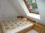 Schlafzimmer mit Doppelbett
